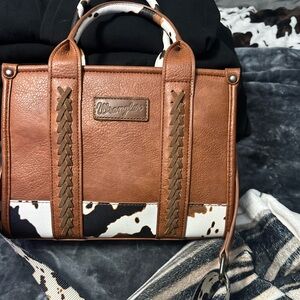 Cow print wrangler purse
